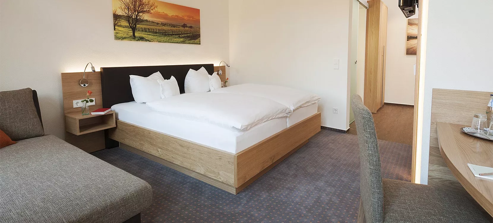 Modern hotel rooms at the Landhotel Behre